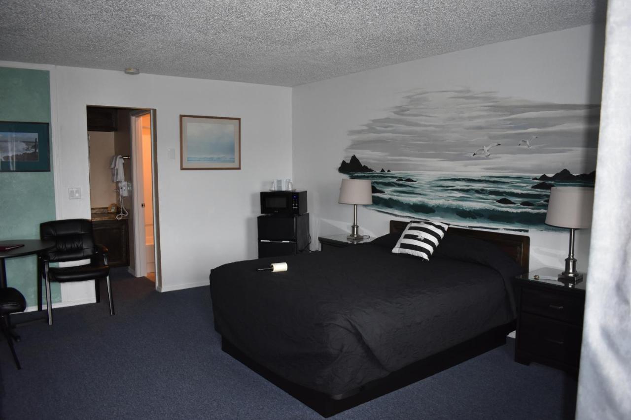 Lighthouse Cove Inn Bandon Exterior foto A room at the Inn at the Opera